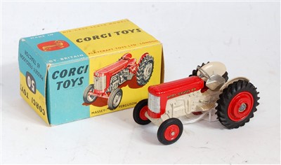 Lot 1664 - A Corgi Toys No. 50 Massey Ferguson 65 tractor,...