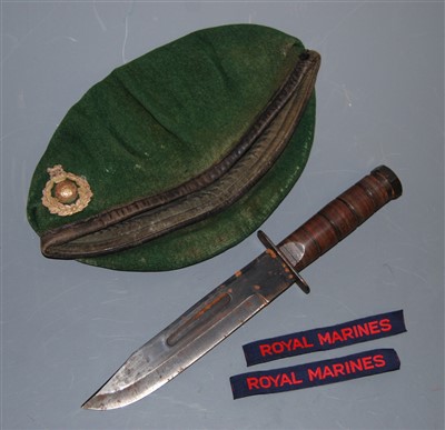 Lot 253 - A green beret with Royal Marine cap badge,...