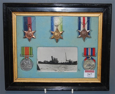 Lot 267 - A framed group of five medals, to include 1939-...