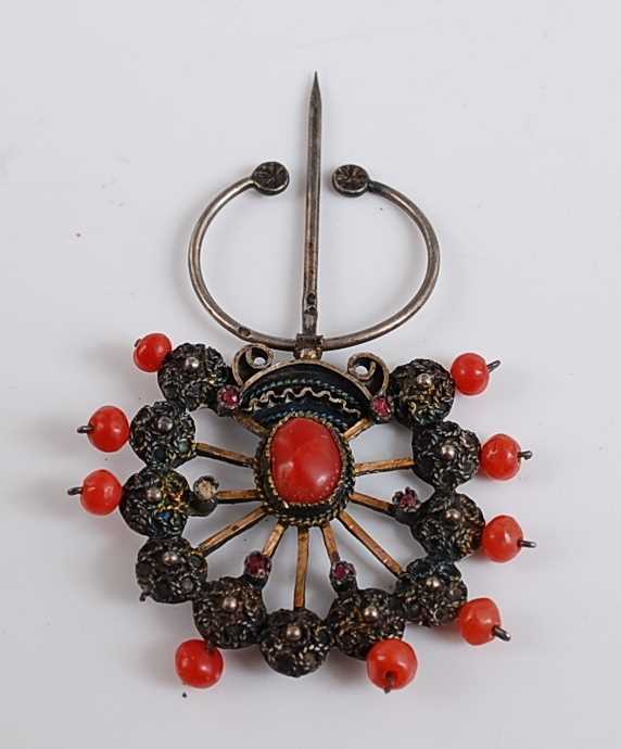 Lot 2508 - A fan shaped coral stick pin, with eleven...