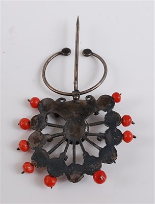 Lot 2508 - A fan shaped coral stick pin, with eleven...