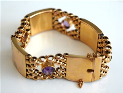 Lot 2542 - A 9ct gold and amethyst set link bracelet,...
