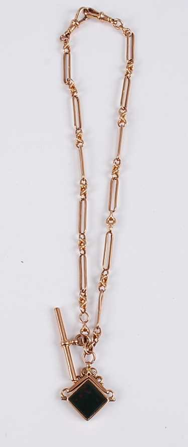 Lot 2560 - A circa 1900 9ct gold double watch chain,...