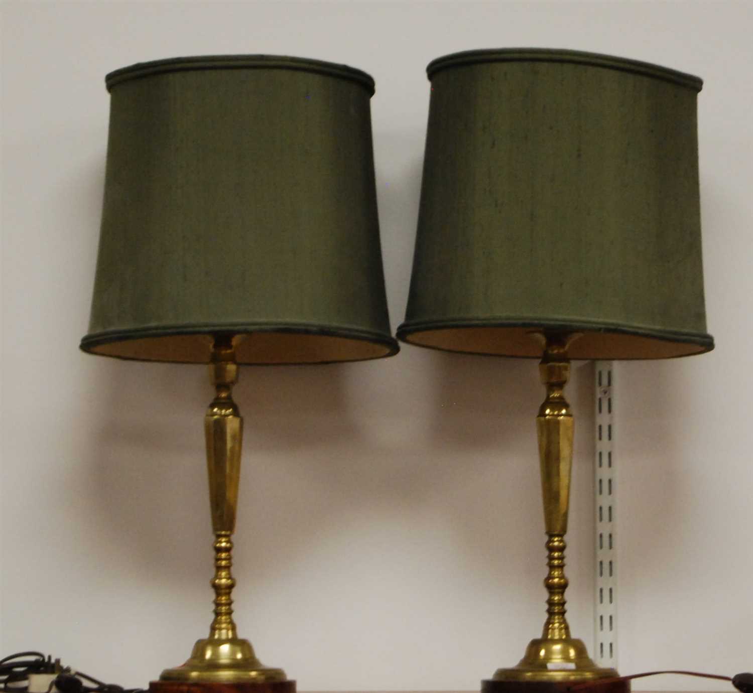 Lot 14 - A pair of contemporary turned brass table...