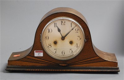 Lot 17 - A 1930s oak cased mantel clock having a...