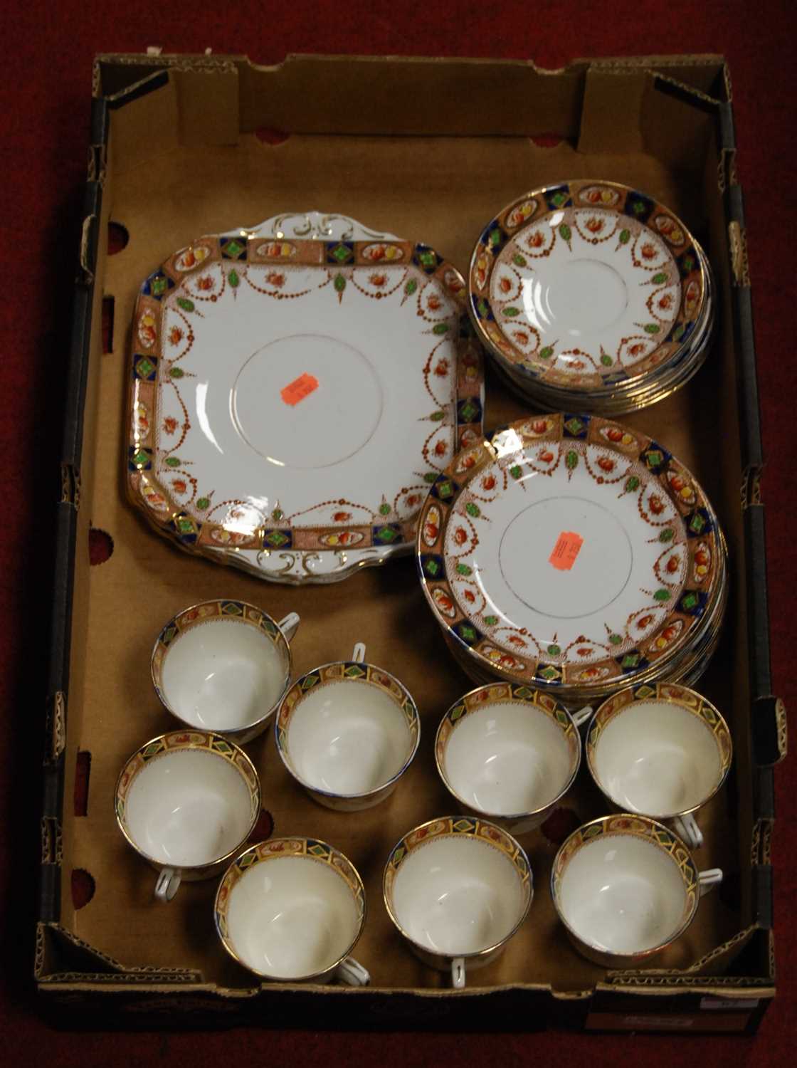 Lot 67 - An early 20th century eight place setting...