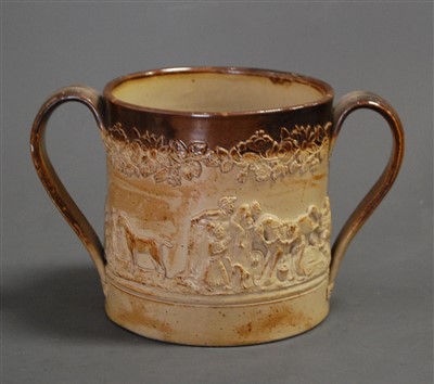 Lot 99 - A Victorian salt glazed stoneware loving cup,...