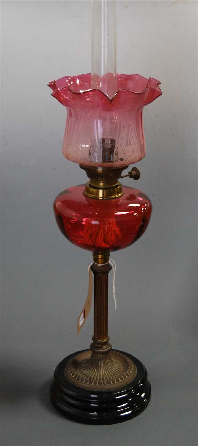 Lot 103 - A late Victorian oil lamp, having an etched...