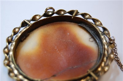 Lot 402 - A Victorian carved shell cameo brooch as a...