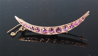 Lot 405 - An early 20th century 9ct gold and amethyst...