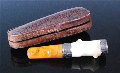 Lot 411 - A silver mounted meerschaum and amber cheroot...