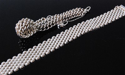 Lot 434 - A modern silver chain link bracelet; and one...