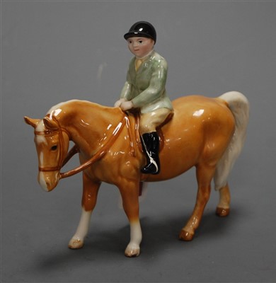 Lot 294 - A Beswick figure of a Boy on Palomino pony,...