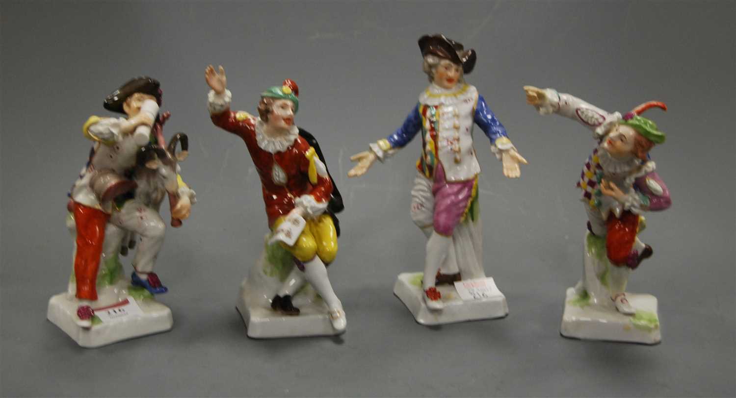 Lot 304 - A continental porcelain figure of a bagpipe...