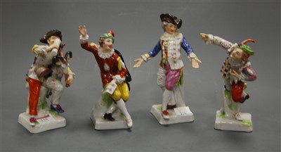 Lot 304 - A continental porcelain figure of a bagpipe...