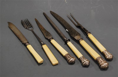 Lot 331 - An early 20th century four-piece carving set,...