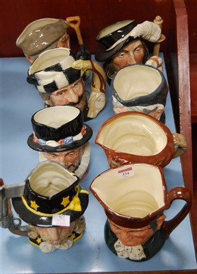 Lot 334 - Eight Royal Doulton character jugs, comprising...