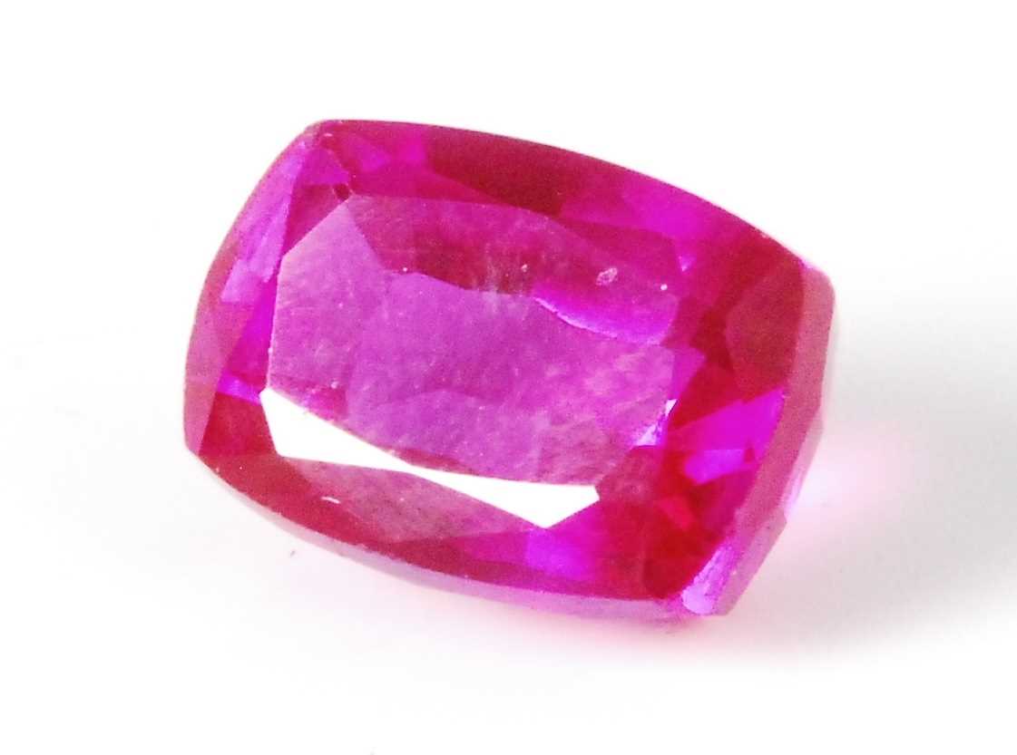 Lot 444 - A loose heat-treated natural pink sapphire,...