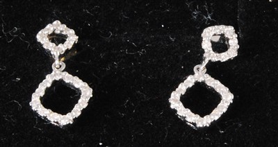 Lot 451 - A pair of modern 18ct white gold and diamond...