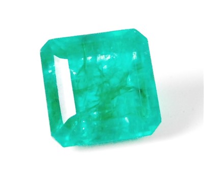 Lot 454 - A loose enhanced natural emerald, of green...
