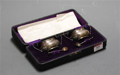 Lot 359 - A pair of George V silver open salts of squat...