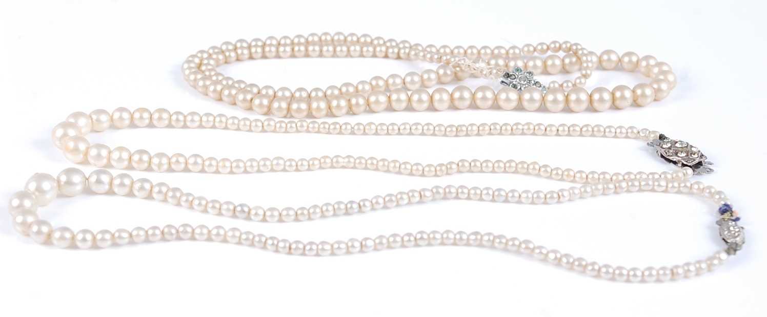 Lot 476 - Three various faux pearl necklaces, each...