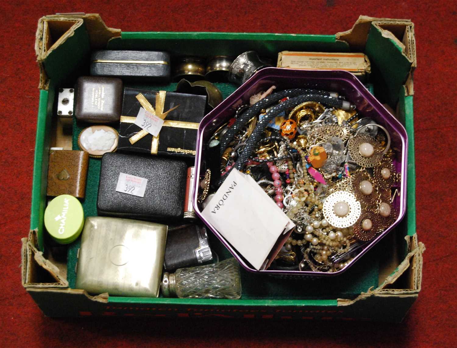 Lot 392 - A box of miscellaneous items to include silver...