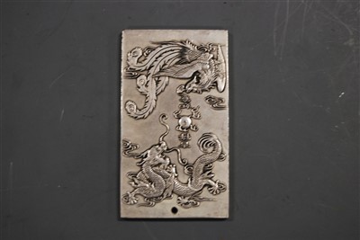 Lot 396 - A Chinese white metal trade token of...