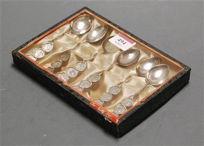Lot 494 - A set of six white metal spoons, each having a...