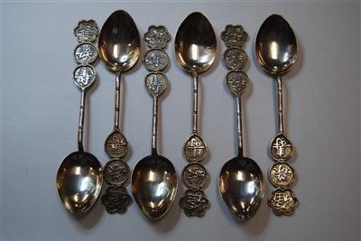 Lot 494 - A set of six white metal spoons, each having a...
