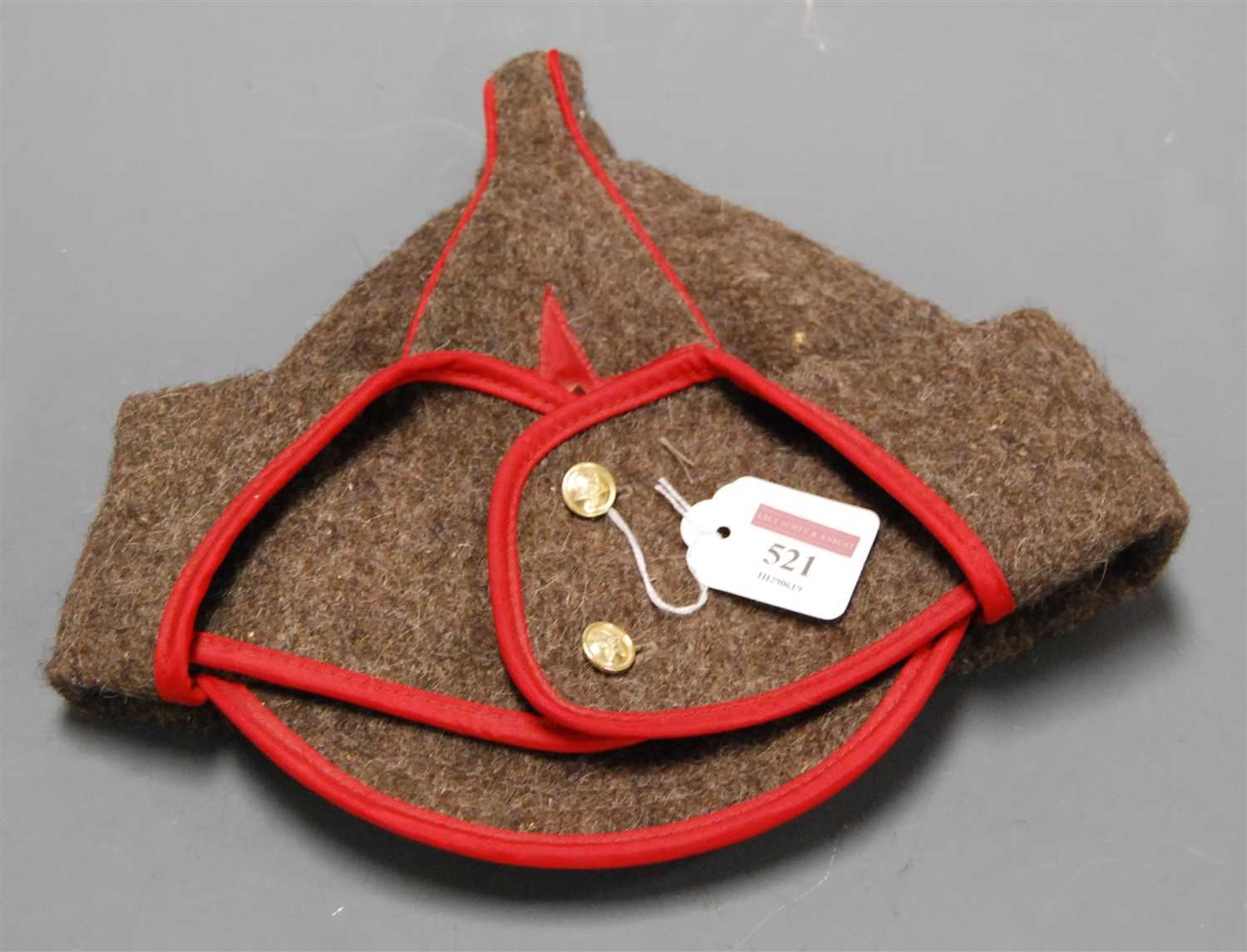 Lot 521 - A Soviet Red Army Budenovka having stitched...