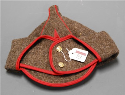 Lot 521 - A Soviet Red Army Budenovka having stitched...