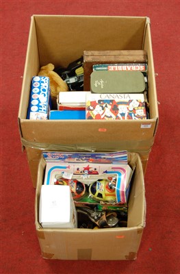 Lot 604 - Two boxes of assorted toys and games to...
