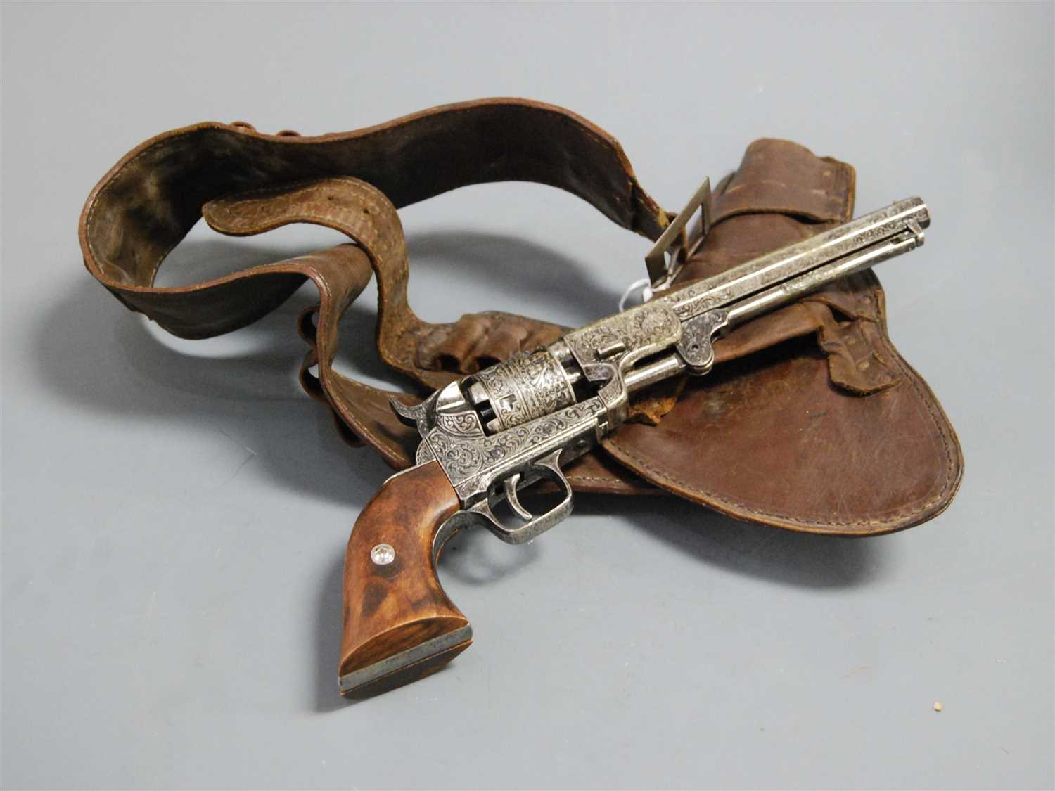Lot 36 - A reproduction model of a Colt revolver,...
