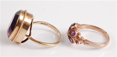 Lot 2520 - A pair of 9ct gold amethyst rings, one...