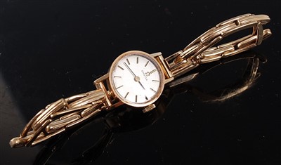 Lot 2532 - A lady's 9ct yellow gold Omega manual wind...