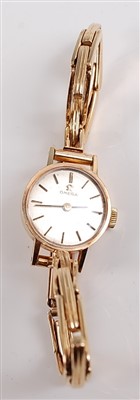Lot 2532 - A lady's 9ct yellow gold Omega manual wind...