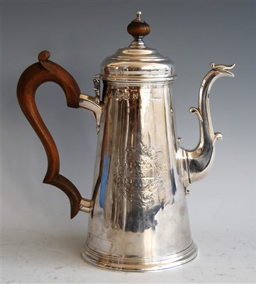 Lot 1066 - A silver coffee pot, 18th century with later...