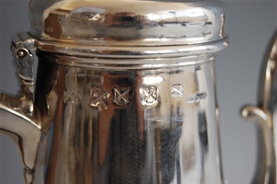 Lot 1066 - A silver coffee pot, 18th century with later...