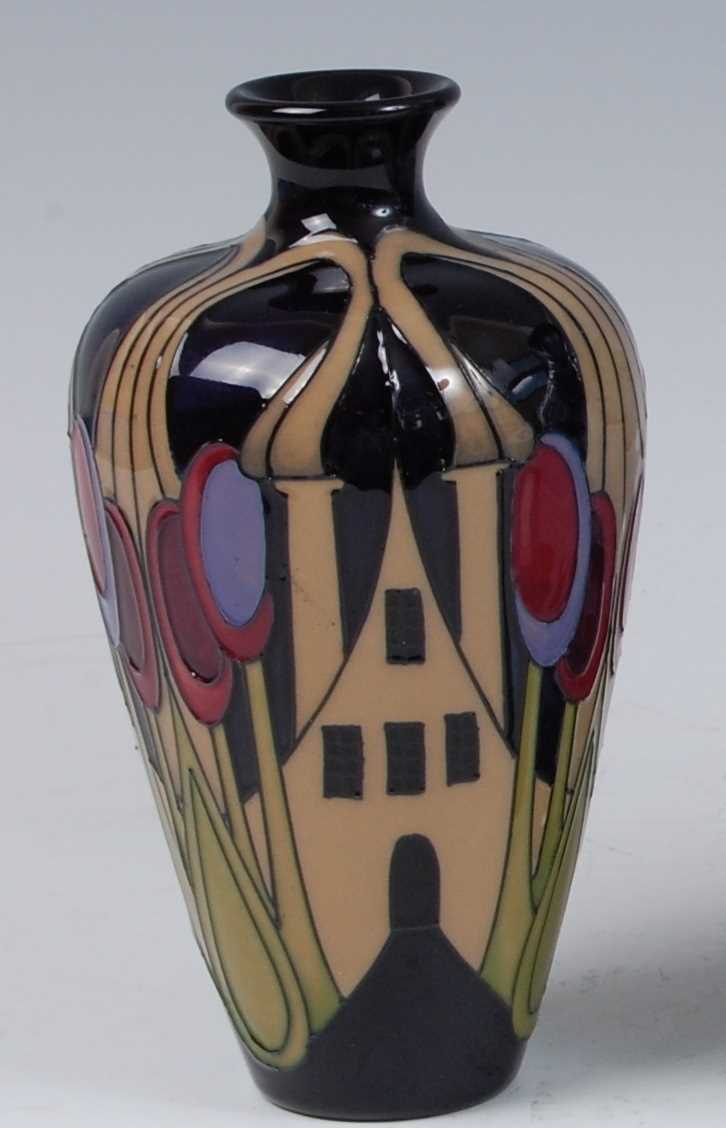 Lot 155 - A Moorcroft pottery vase in the Hamlet pattern,...