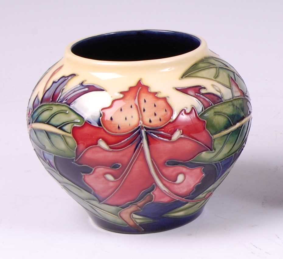 Lot 158 - A Moorcroft pottery squat vase in the Simeon...