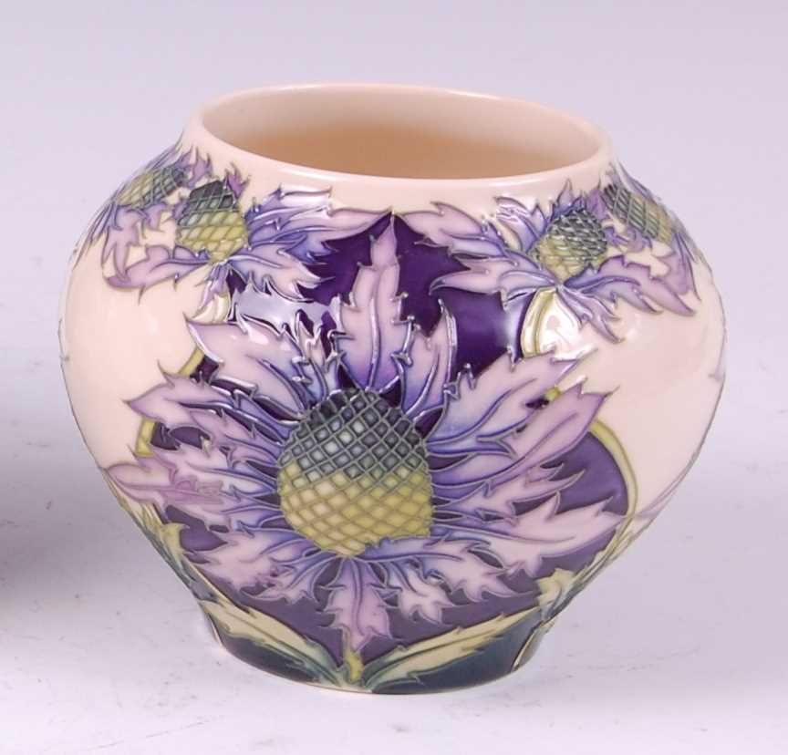 Lot 160 - A Moorcroft pottery squat vase in the...