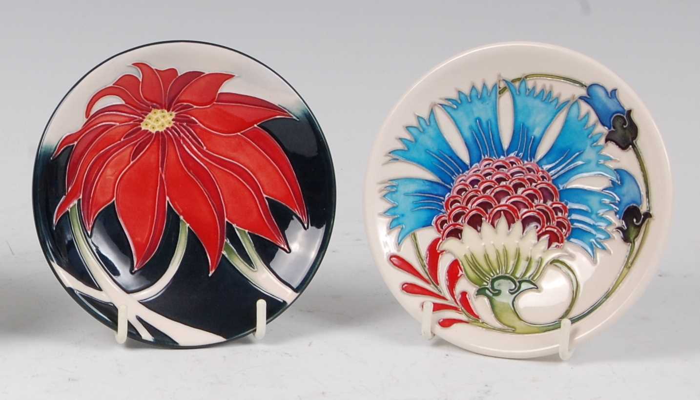 Lot 167 - A Moorcroft pottery circular pin-tray in the...