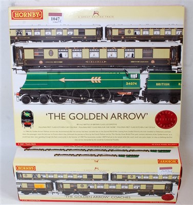 Lot 1047 - A Hornby R2369 'The Golden Arrow' train pack...