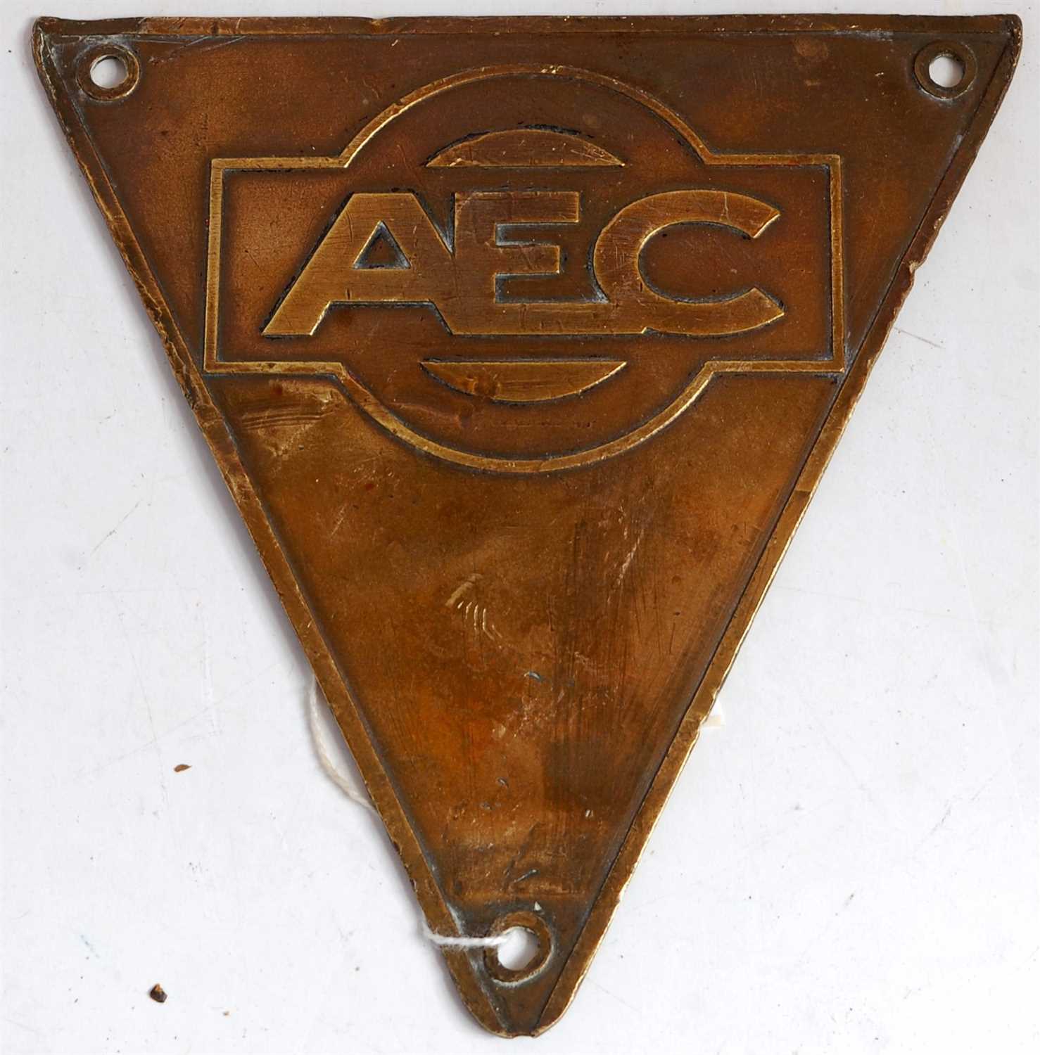 Lot 67 - A brass bus or lorry triangular maker's plate AEC