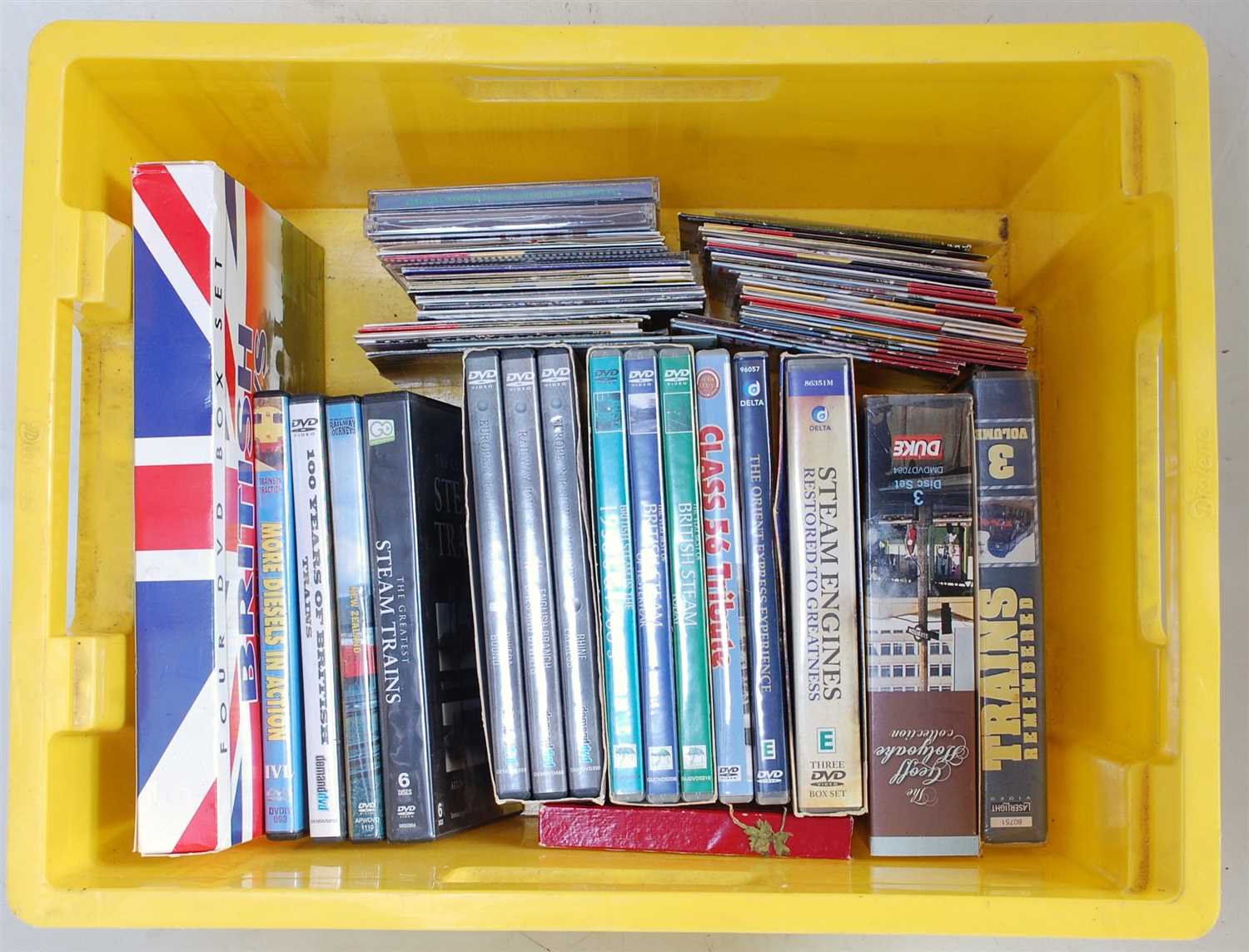 Lot 60 - A box of railway related DVDs and CDs, some...