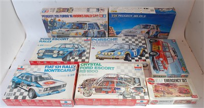 Lot 1571 - Eight various boxed plastic racing car and...