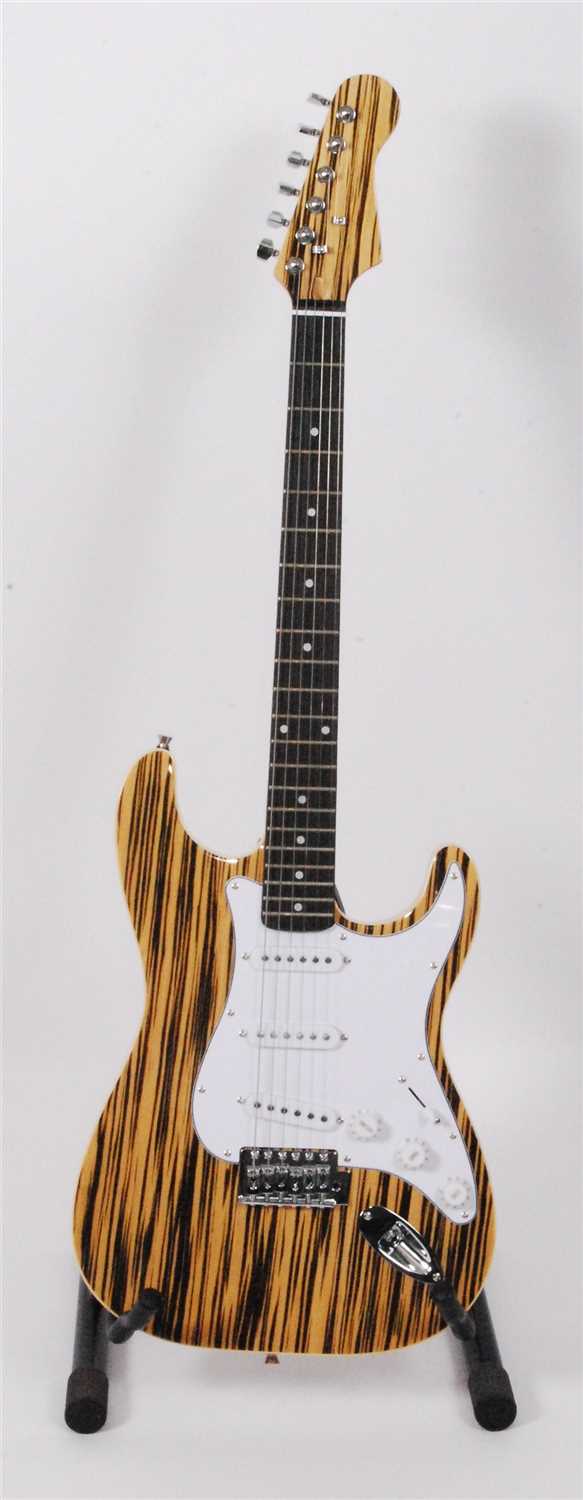 Lot 613 - A Santander stratocaster electric guitar, in natural finish