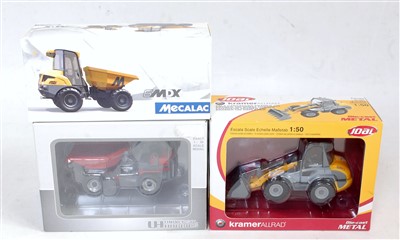 Lot 2706 - Three various boxed construction diecasts to...