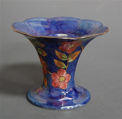 Lot 3 - A 1930s Kensington ware lustre vase on a blue...